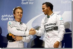 Bahrain International Circuit, Sakhir, Bahrain.
Sunday 06 April 2014.
Nico Rosberg, Mercedes AMG and Lewis Hamilton, Mercedes W05 celebrate on the podium.
World Copyright: Alastair Staley/LAT Photographic.
ref: Digital Image _R6T4480.JPG