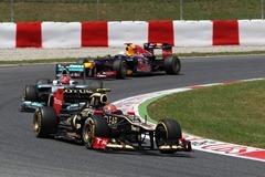 2012 Spanish Grand Prix - Sunday Circuit de Catalunya, Barcelona, Spain 13th May 2012 Romain Grosjean, Lotus E20 Renault, leads Michael Schumacher, Mercedes F1 W03, and Sebastian Vettel, Red Bull RB8 Renault.  World Copyright:Glenn Dunbar/LAT Photographic ref: Digital Image CG8C4937