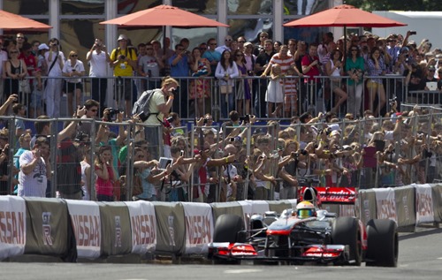 Lewis Hamilton with the Vodafone McLaren Mercedes F1 racing car in action during the Moscow City Race on the 15th of July 2012.