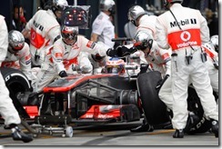 Jenson Button makes a pit stop