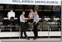 Sam Michael, Eric Boullier and Ron Dennis in the pits.