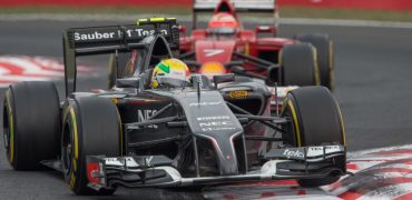 Esteban_Gutierrez-leading-Kimi_Raikkonen-Hungarian_GP-2014.jpg