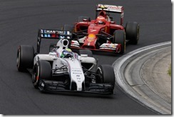 Felipe_Massa-leading-Kimi_Raikkonen-Hungarian_GP-2014